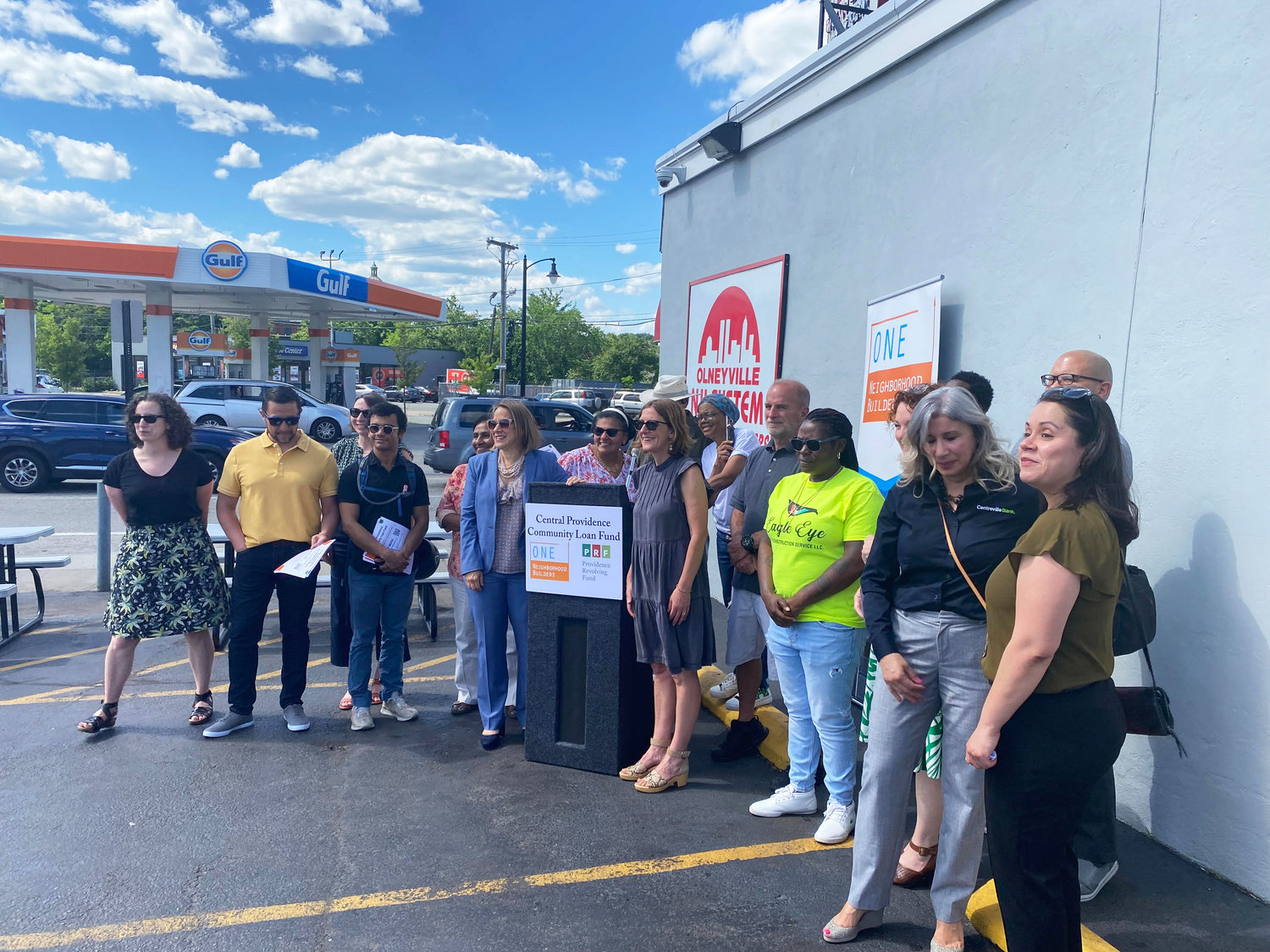 Supporters of the Central Providence Community Loan Fund gathered in the parking lot of Olneyville New York System on June 14 to celebrate its launch.